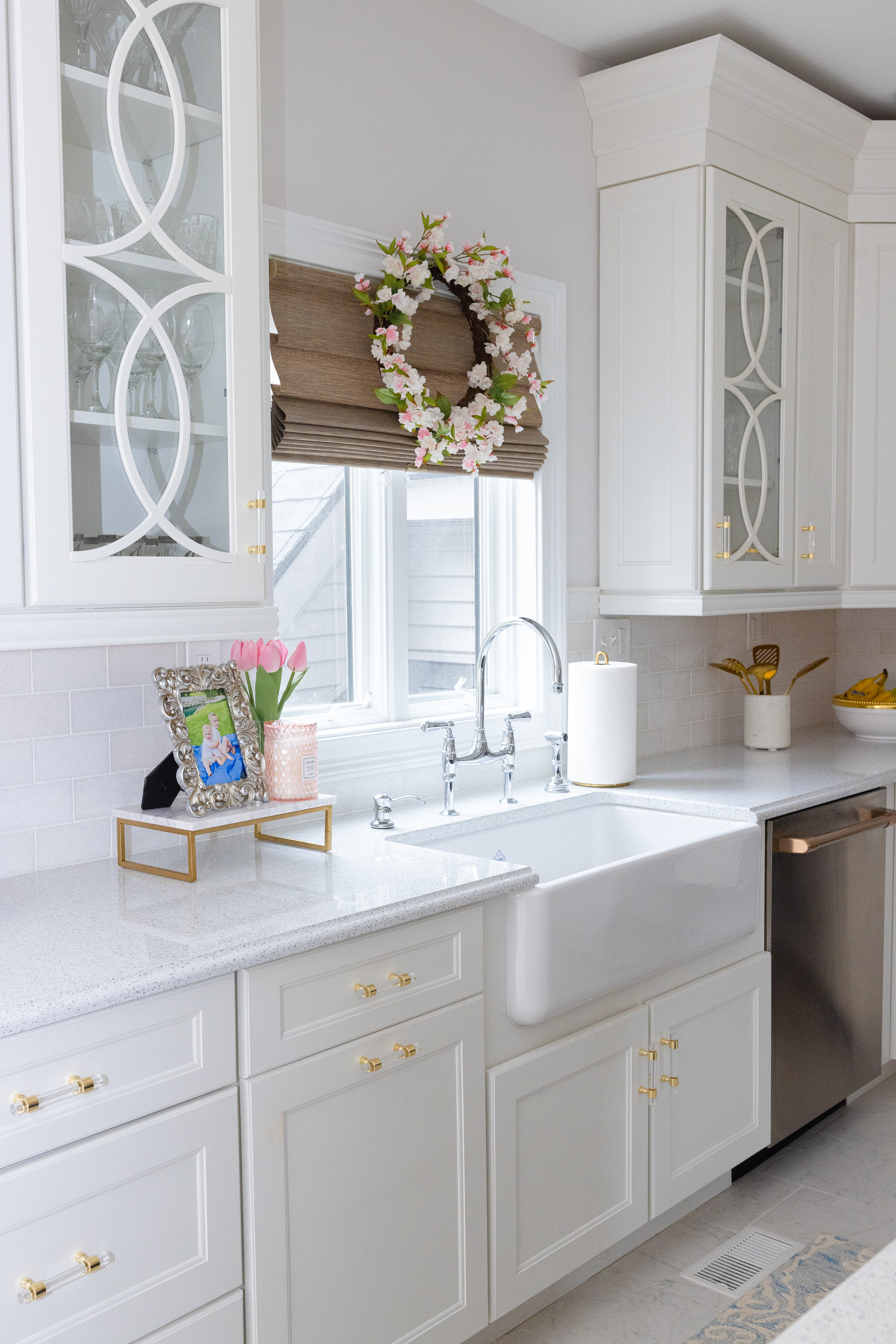 kitchen with sink, white counter, and white cabinets