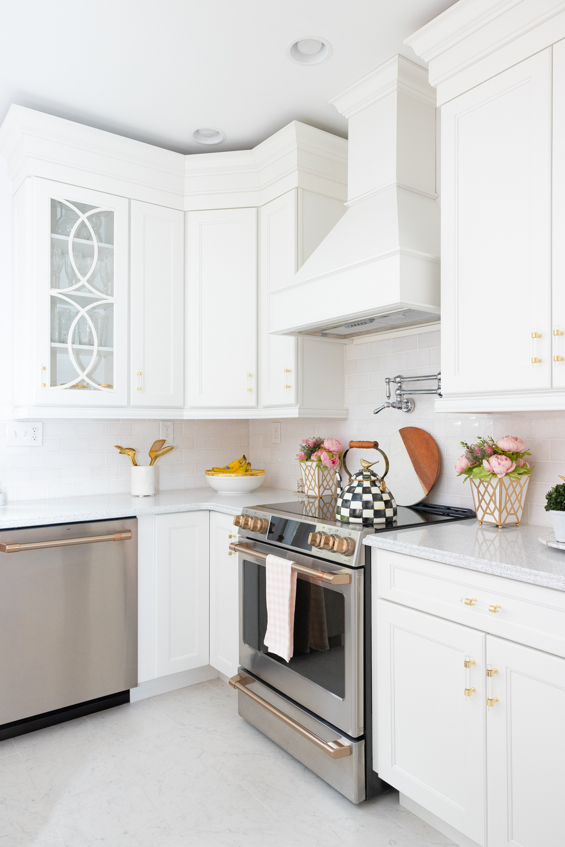 silver oven and white walls in the kitchen