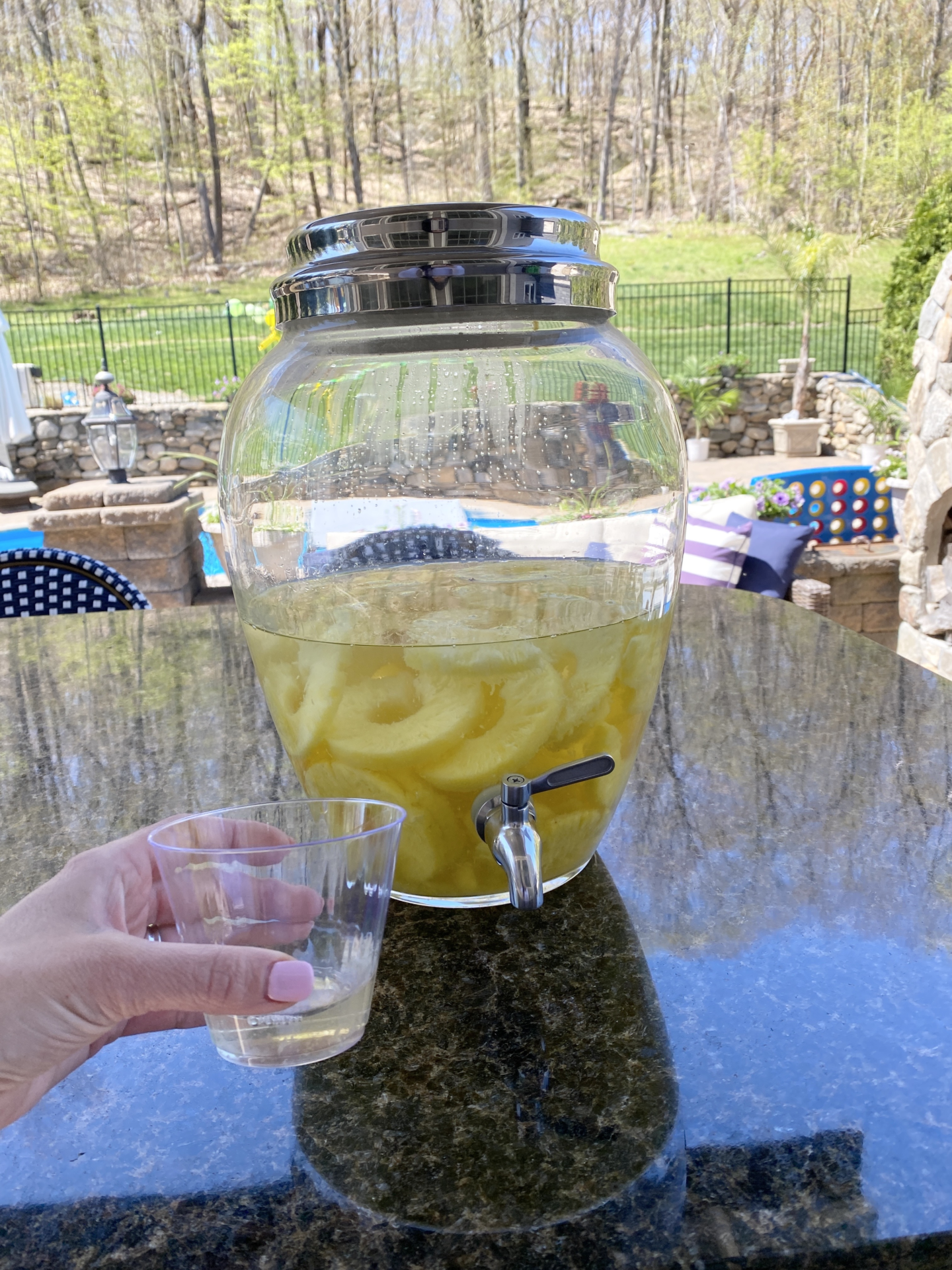 glass jar with faucet with Stoli Doli drink