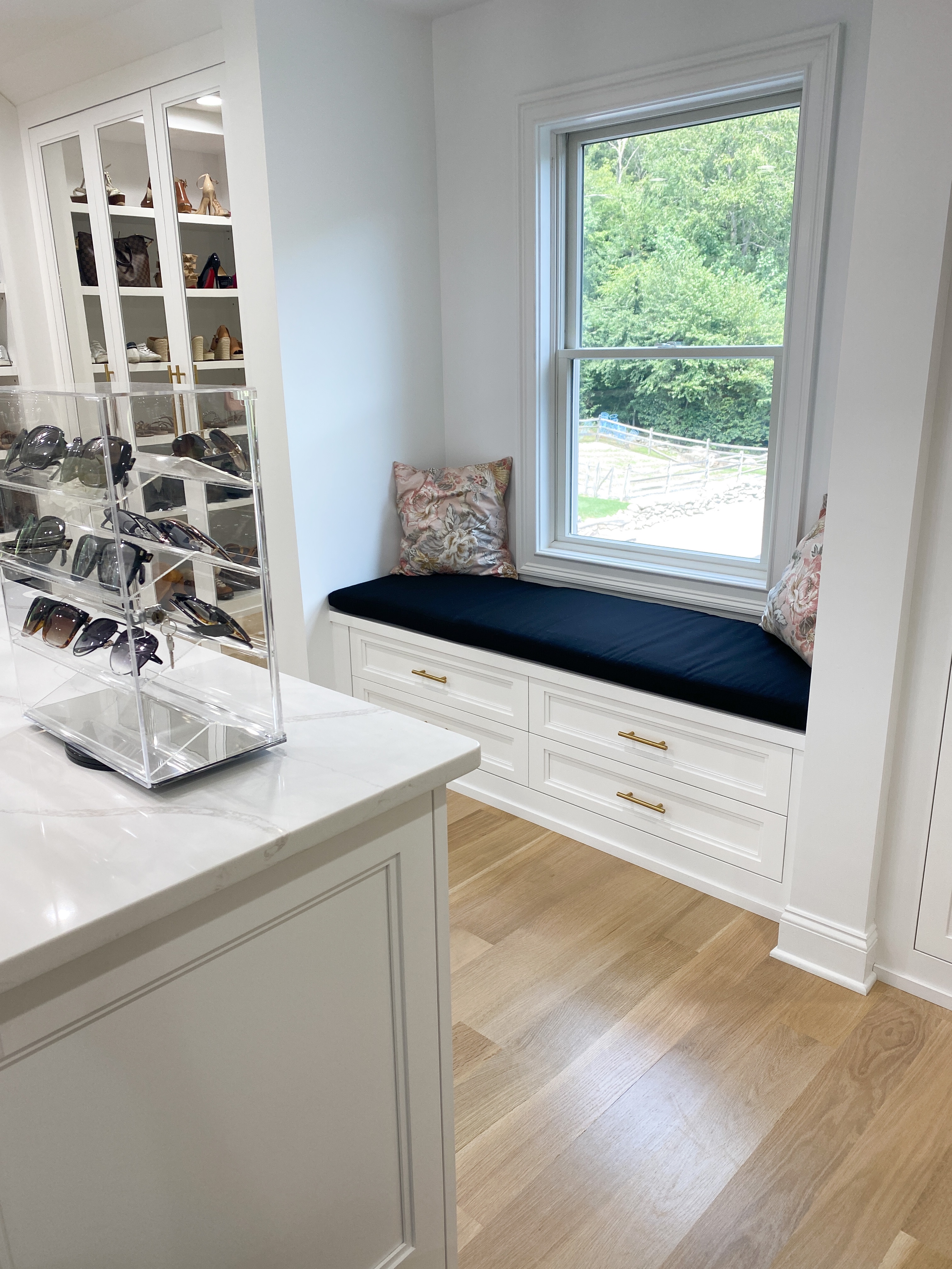 a reading nook near the window in a Custom Closet Reveal