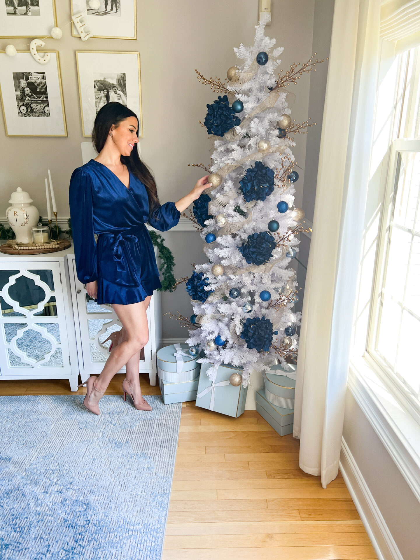 woman sharing Five Holiday Outfit Ideas in blue velvet dress