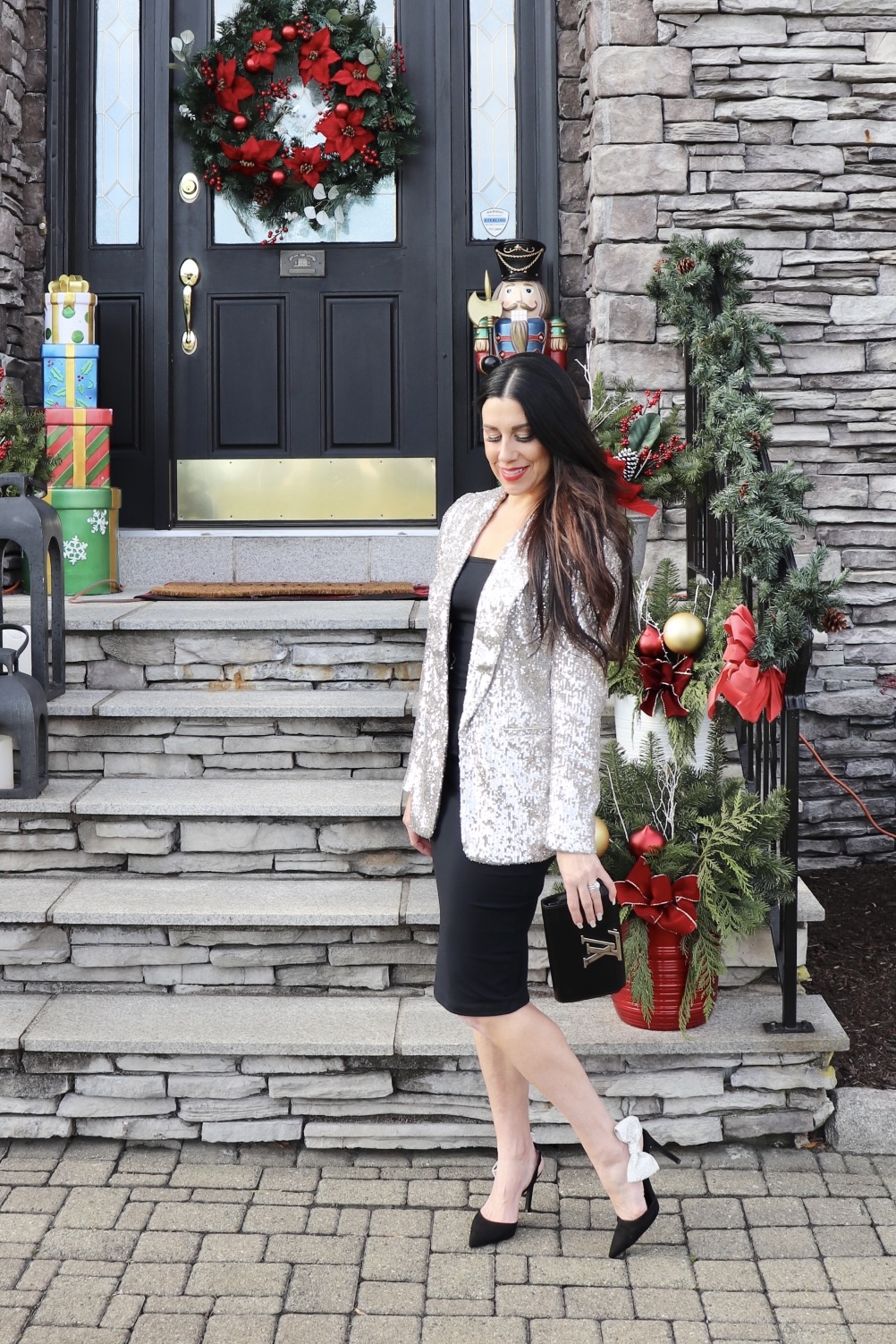 woman wearing black dress and blazer